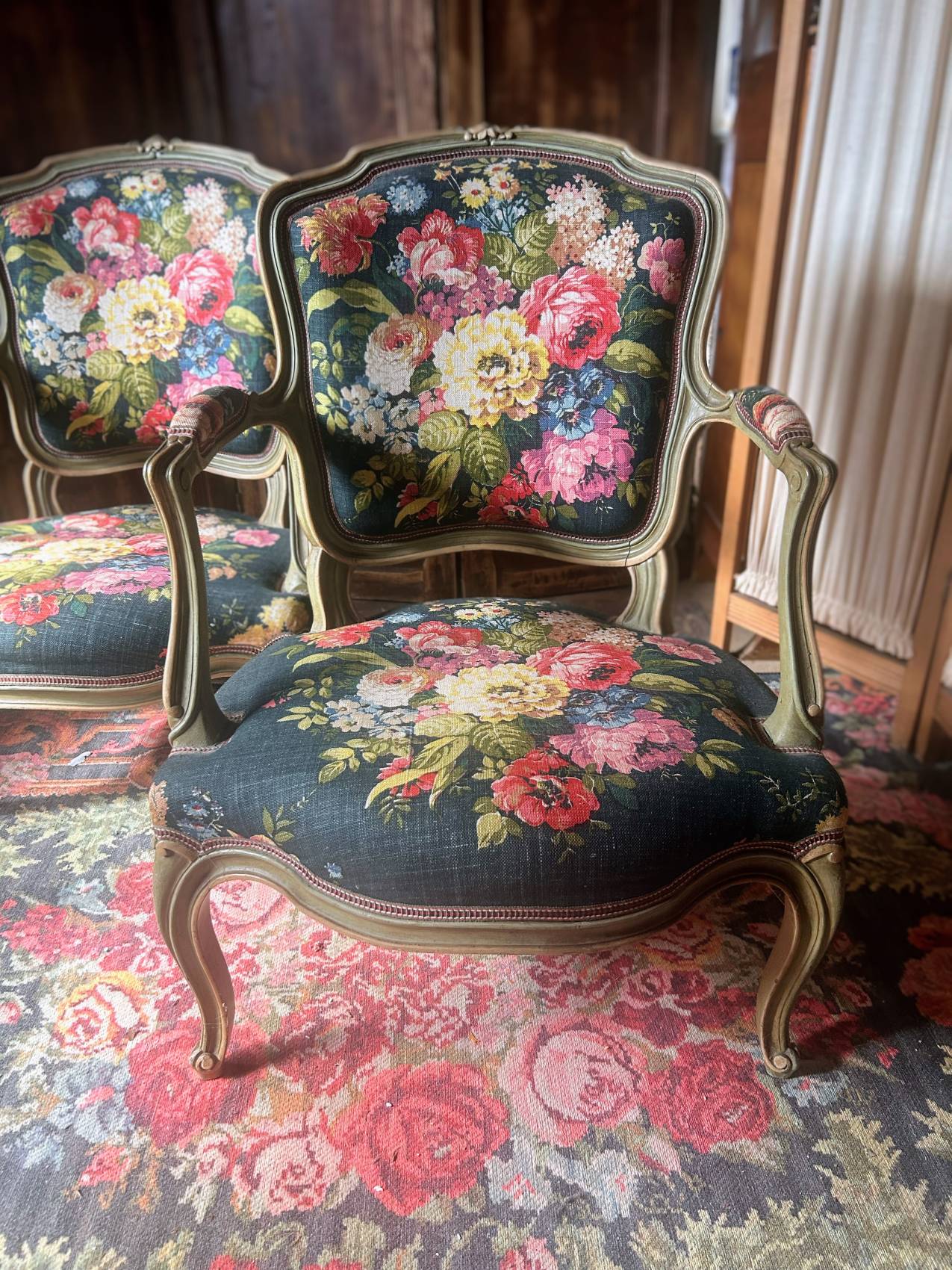 Pair of queen's armchairs with celadon green patina.