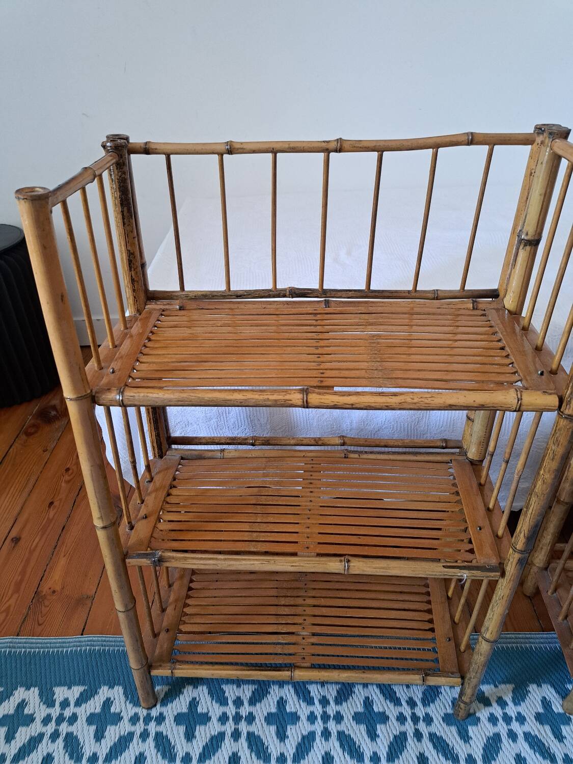 Pair of folding bamboo shelves