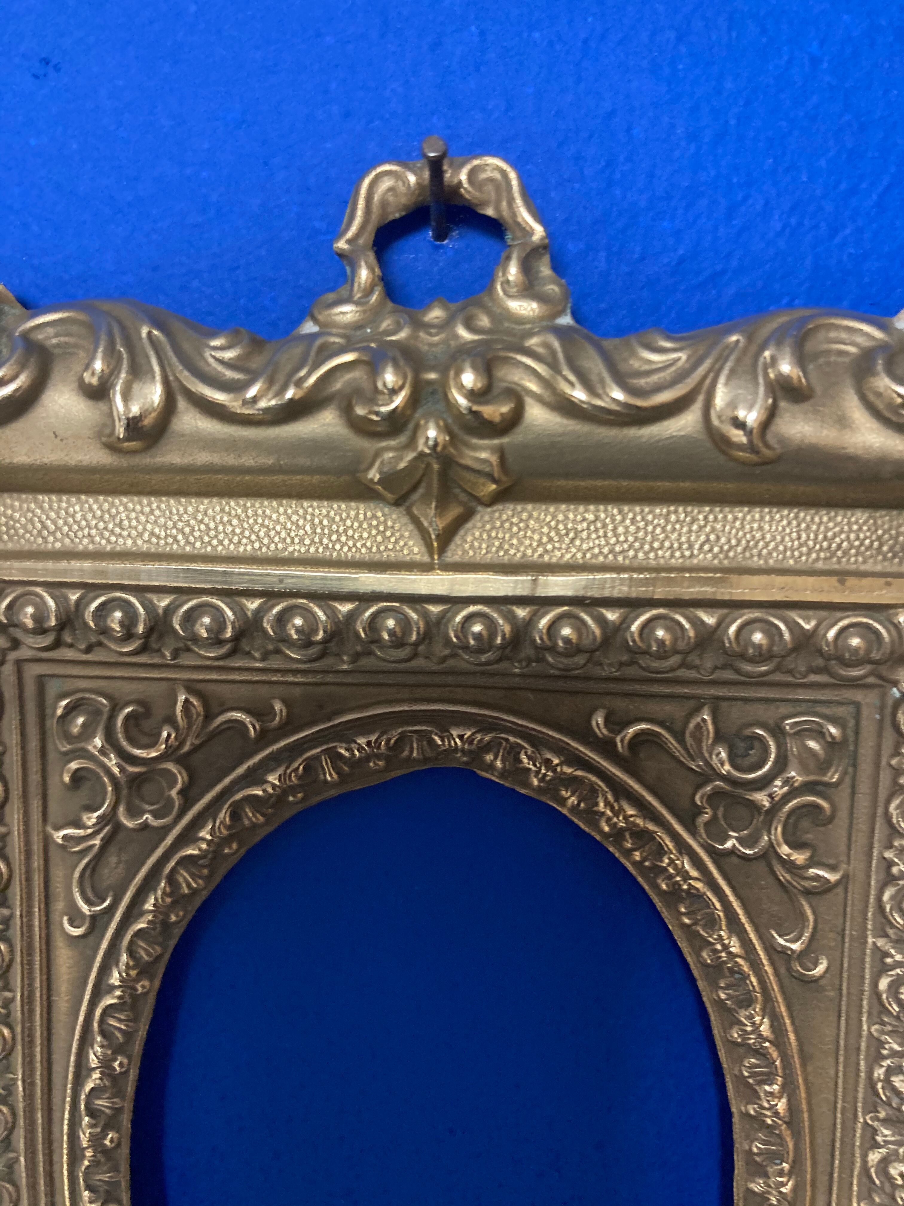 Pair of brass photo frames