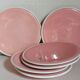 Six old pink earthenware dessert plates