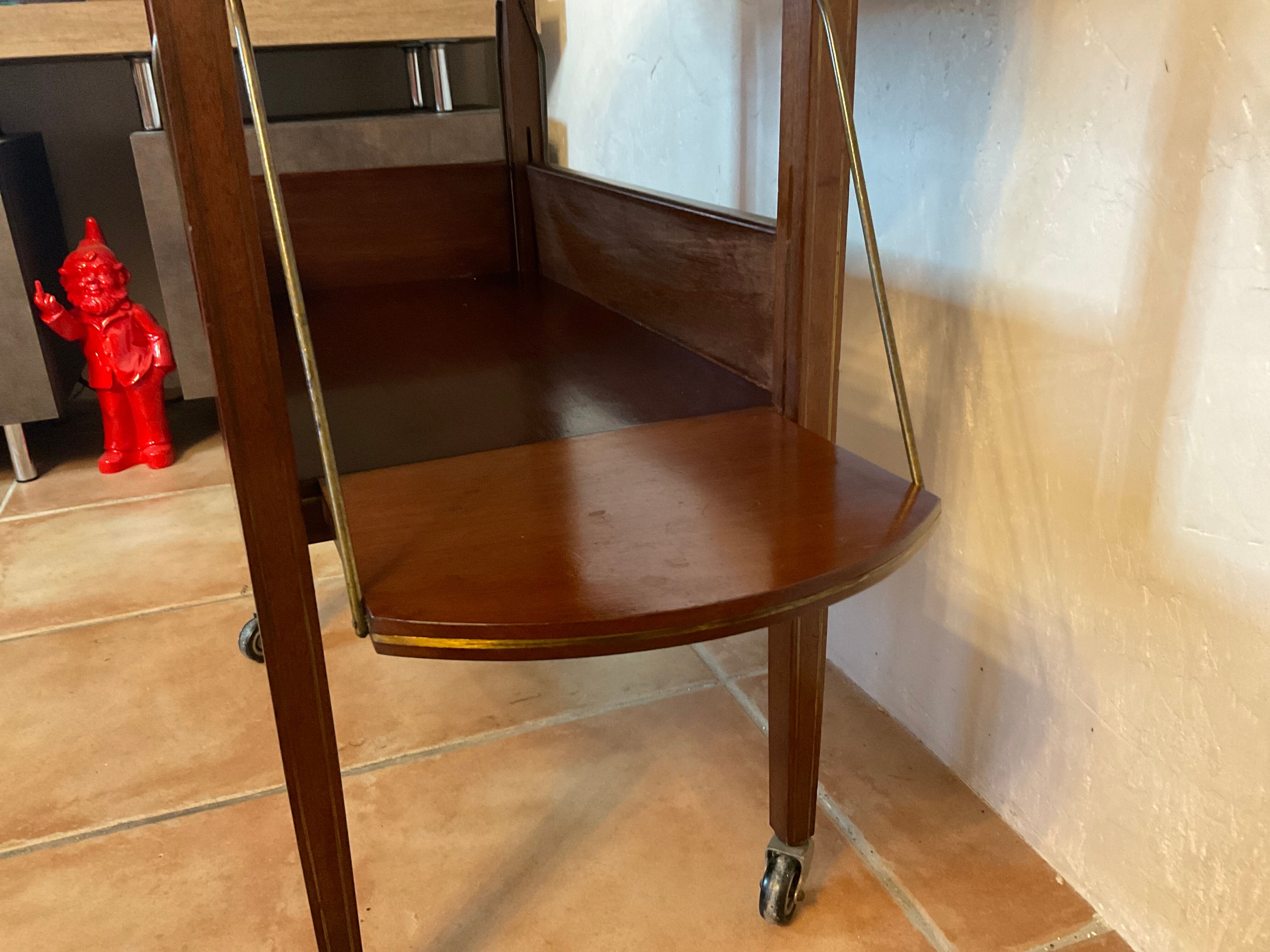 Tea table serving oval maid in mahogany brass marquetry