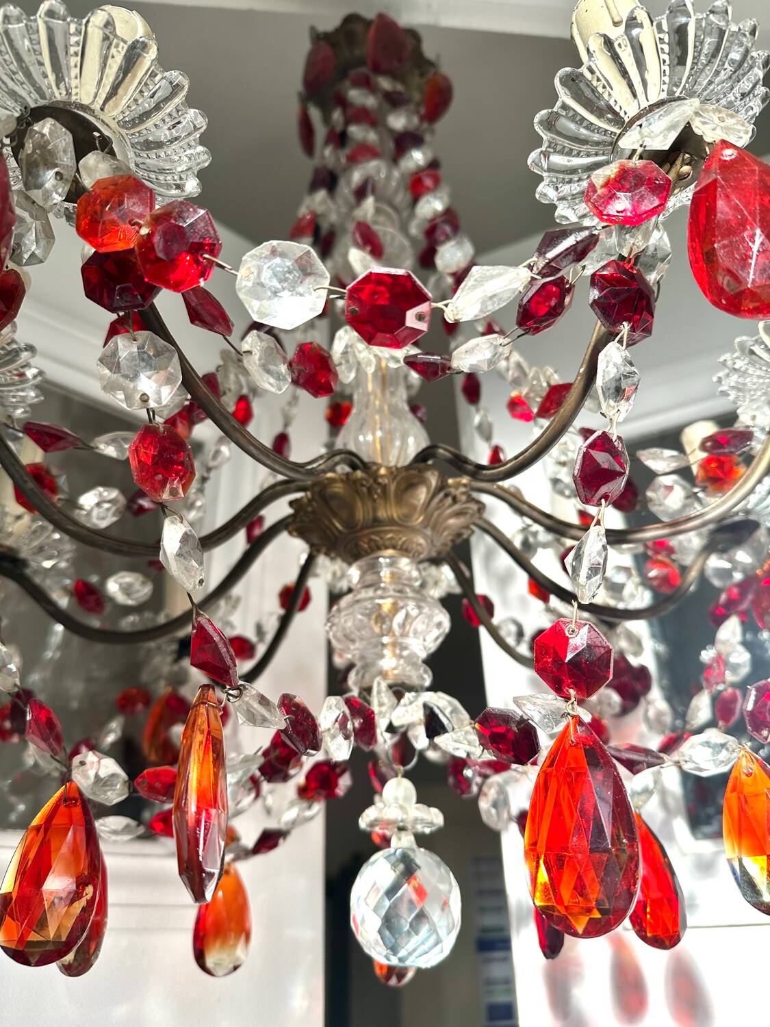 Antique chandelier with red crystal pendants, 9 lights.
