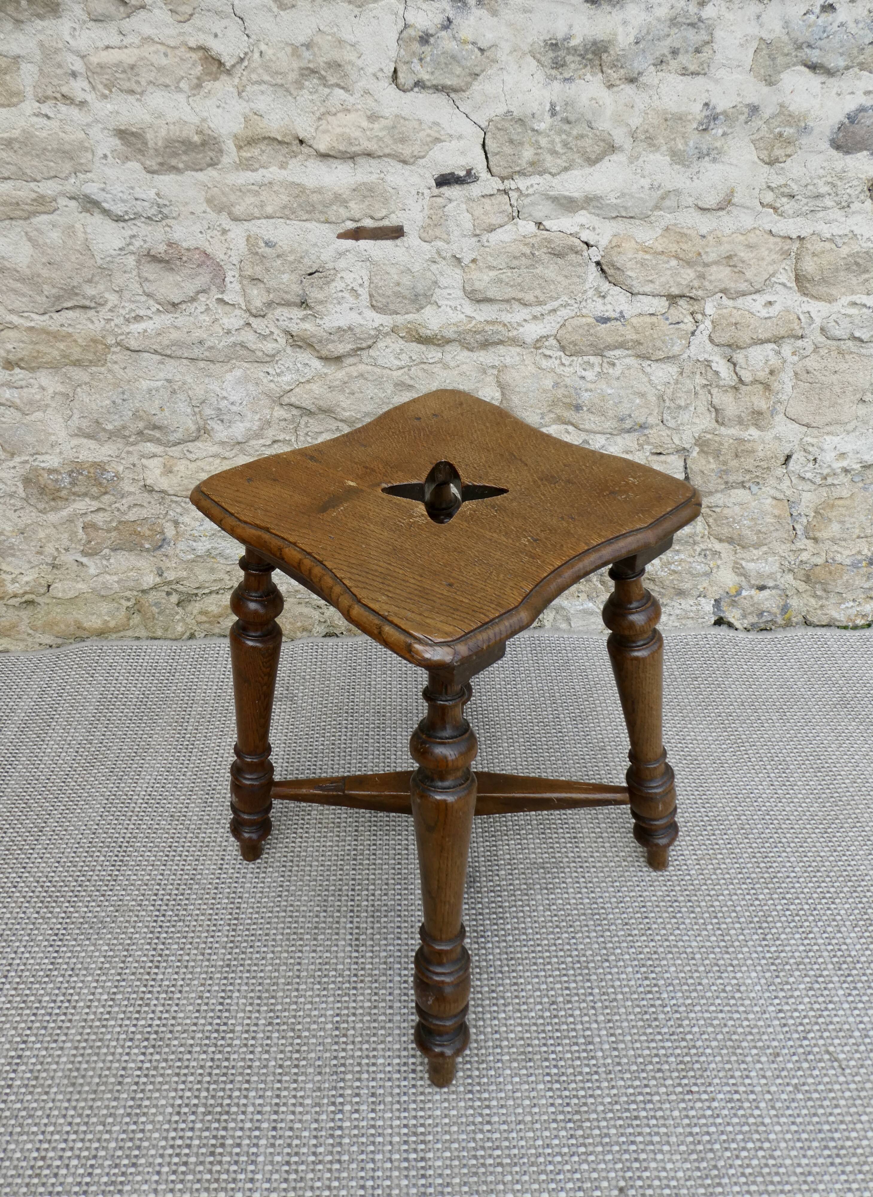 Solid wood and carved stool