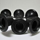 Three Scandinavian black lacquered metal candle holders