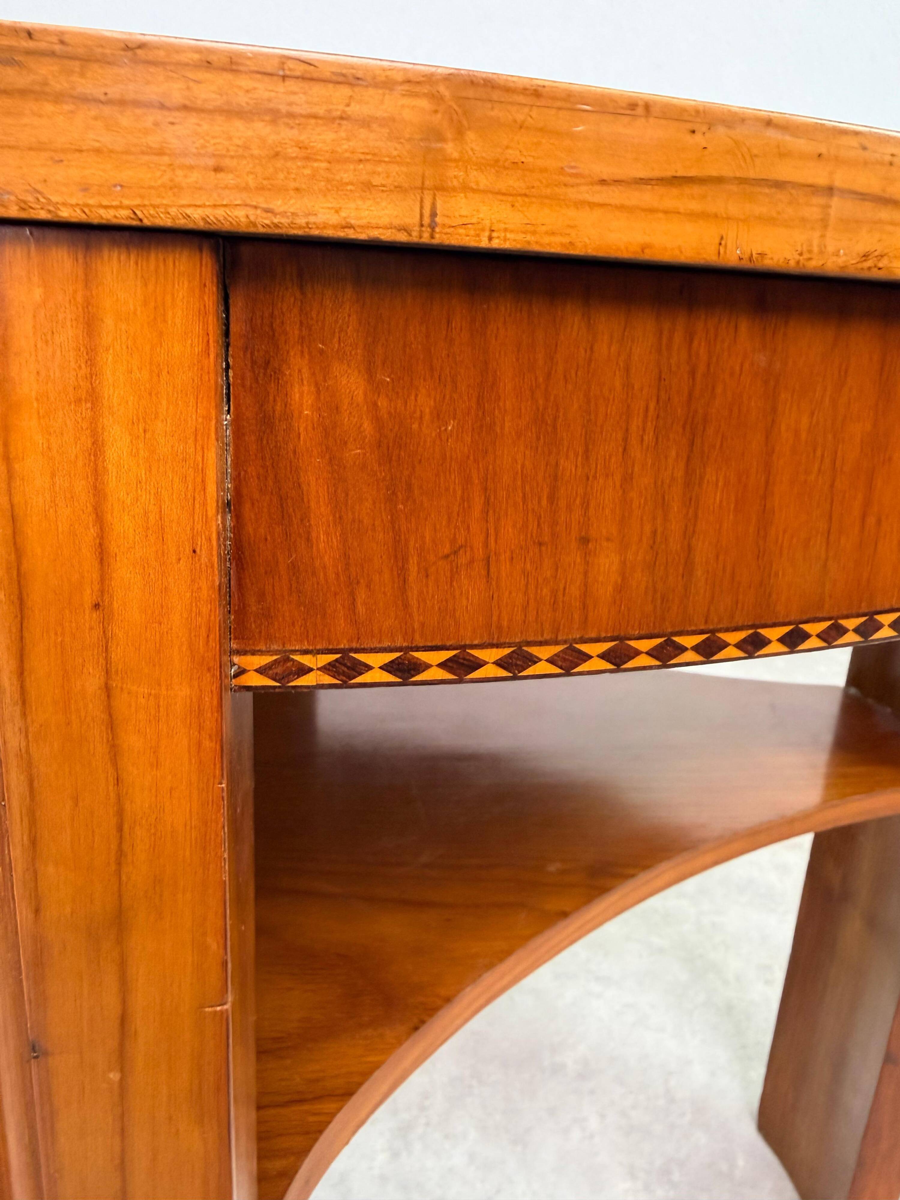 Oval side table in the style of Kolo Moser