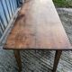 Antique chestnut farmhouse table with 3 drawers on the front.
