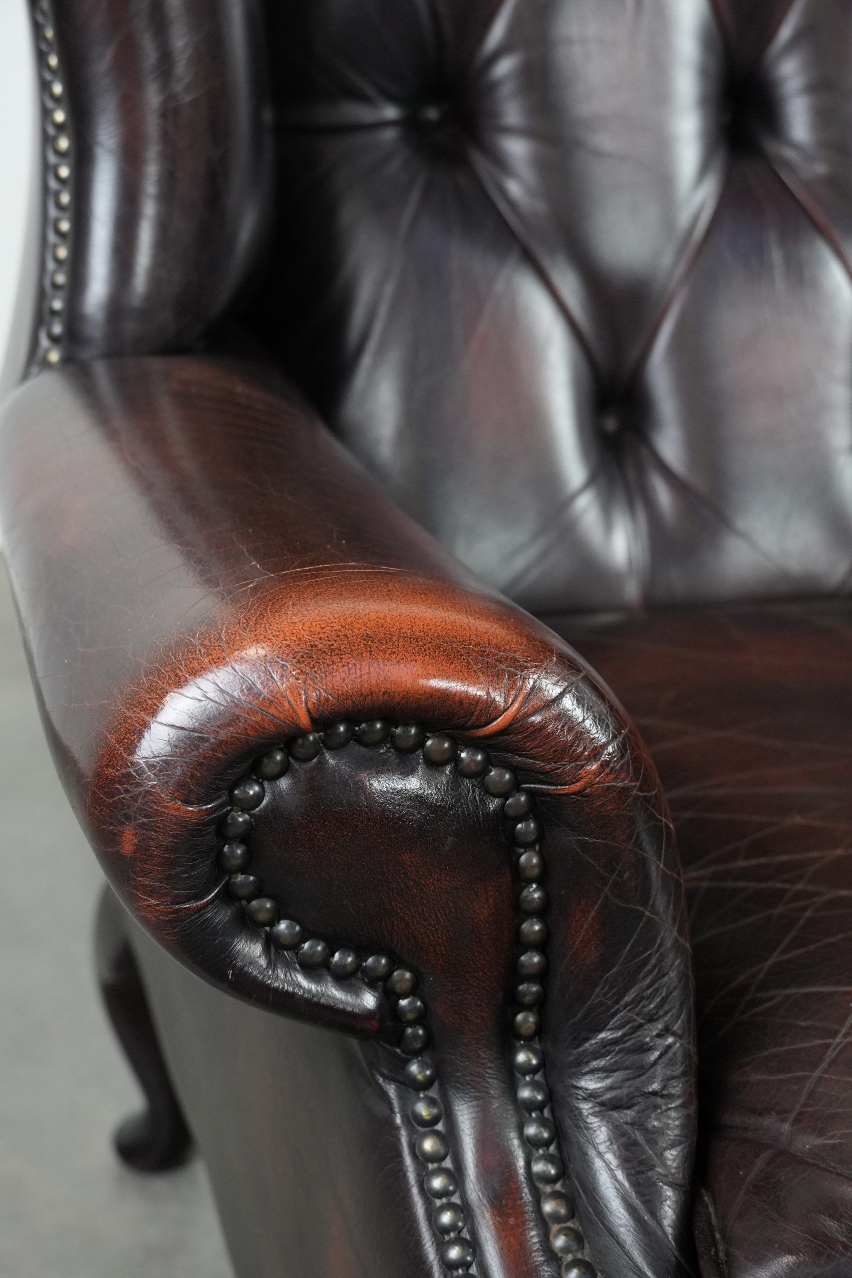 Cowhide leather Chesterfield wingback armchair in classic English style