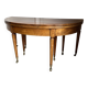 Large oval table from the early 19th century in walnut, 3.17m with extensions.
