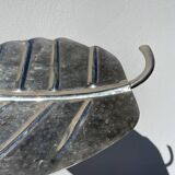 Silver metal leaf pocket emptier
