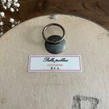 Butterfly frame naturalized curved glass