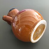 Glazed amber jug