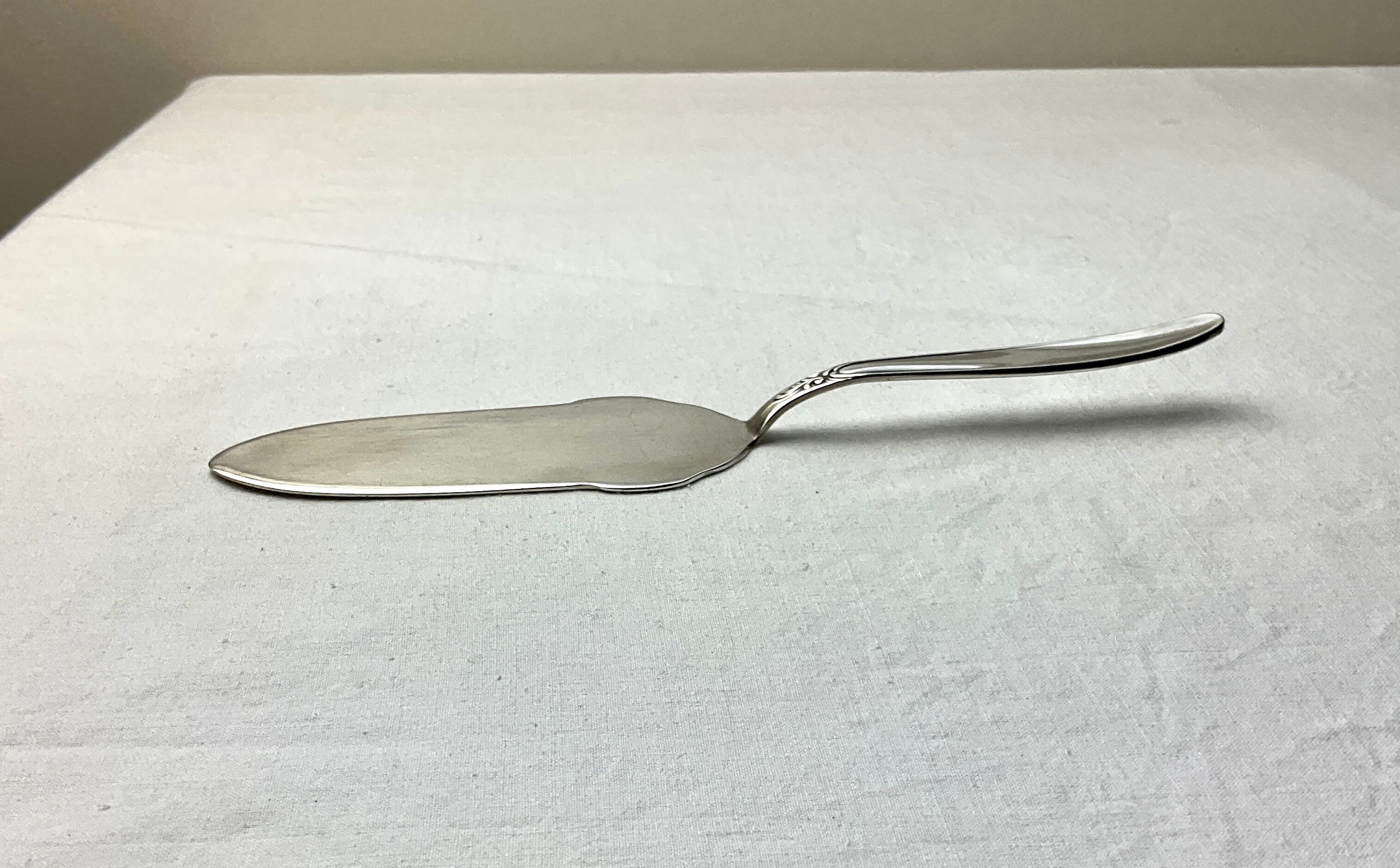 Old Michelin plated silver pie shovel 100