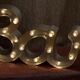 Ancient Light Sign in aluminium lettering forming the word "BAR"