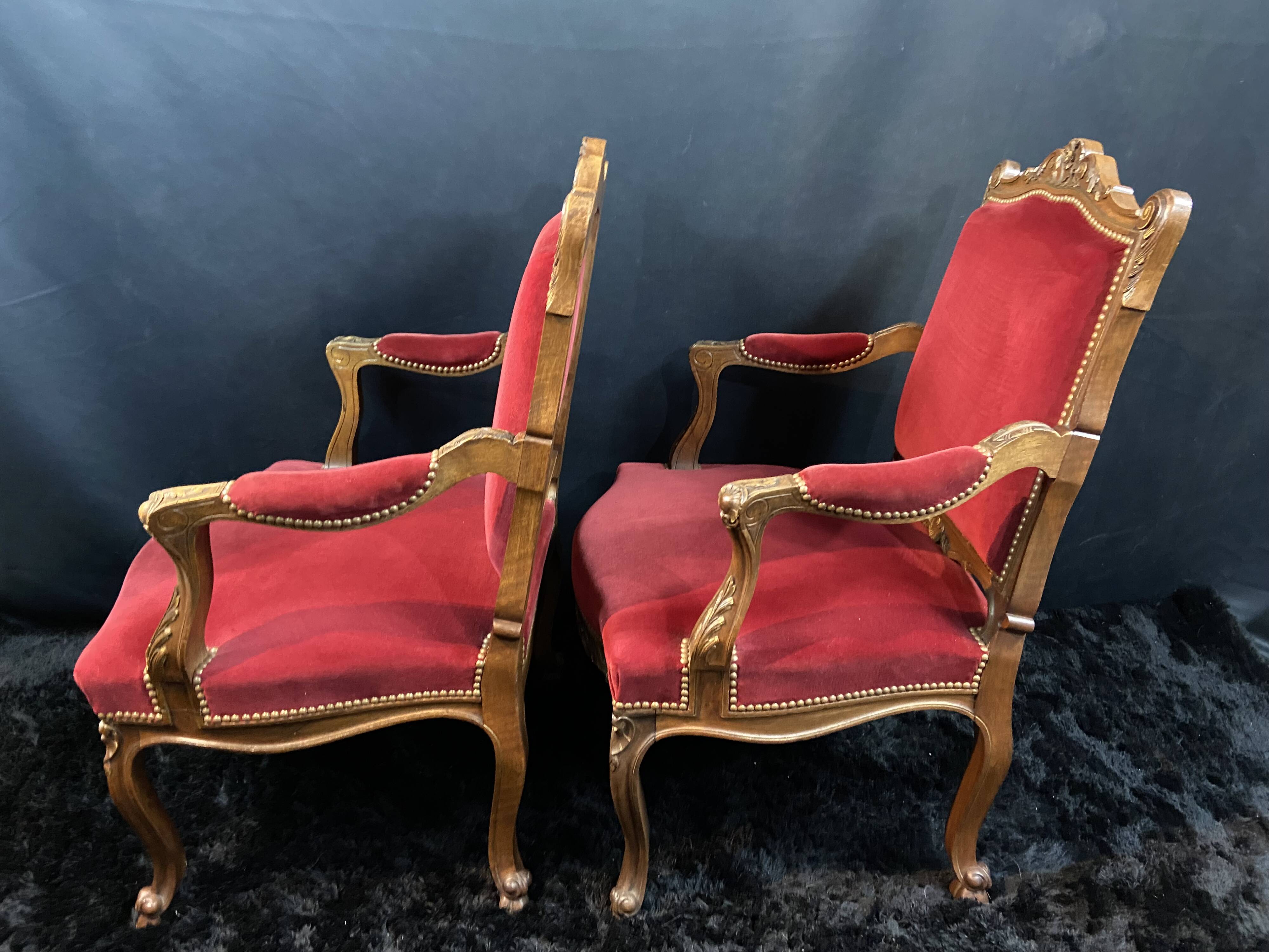 Pair of flat-back armchairs in Louis XV style in red velvet.