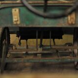 Green metal pedal car