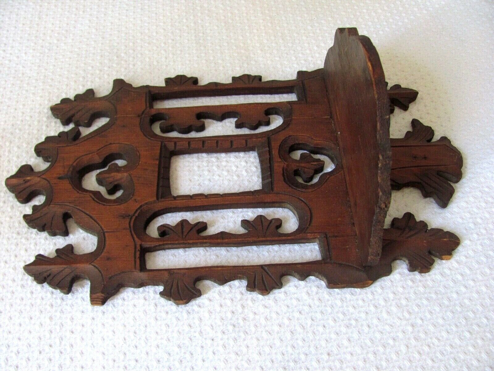 Shelf to hang in carved wood, early 20th century