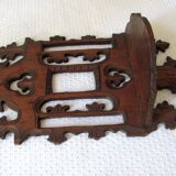 Shelf to hang in carved wood, early 20th century