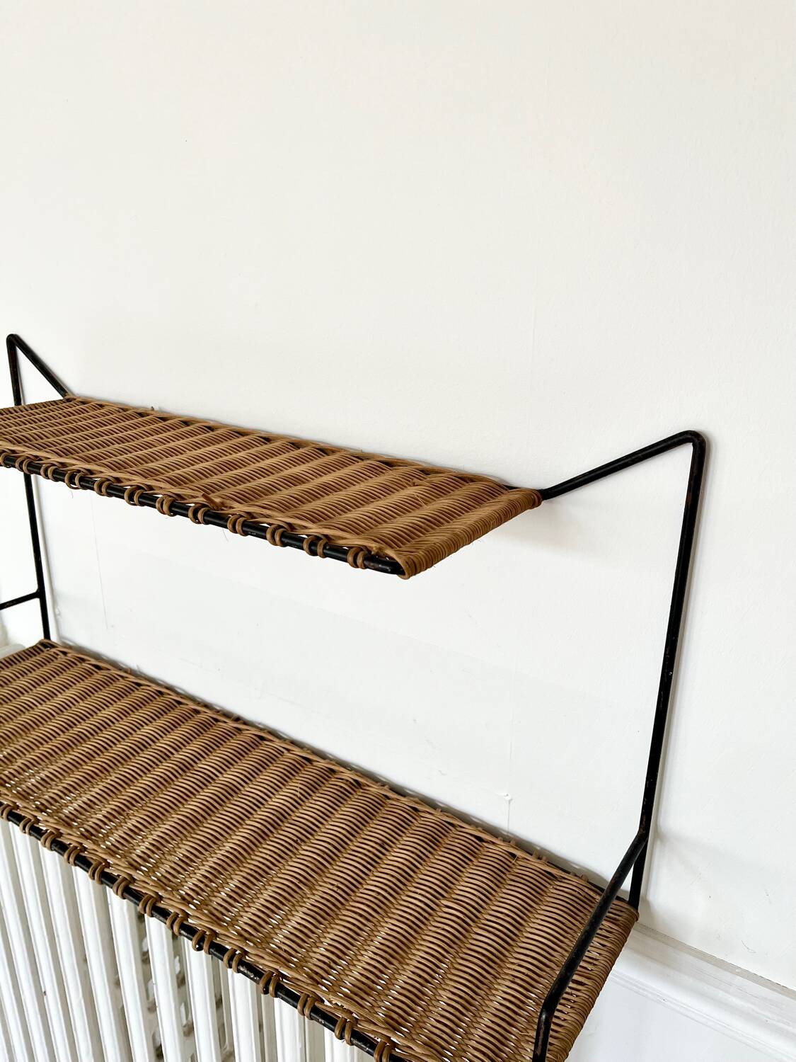 Raoul Guys rattan wall shelf 1950