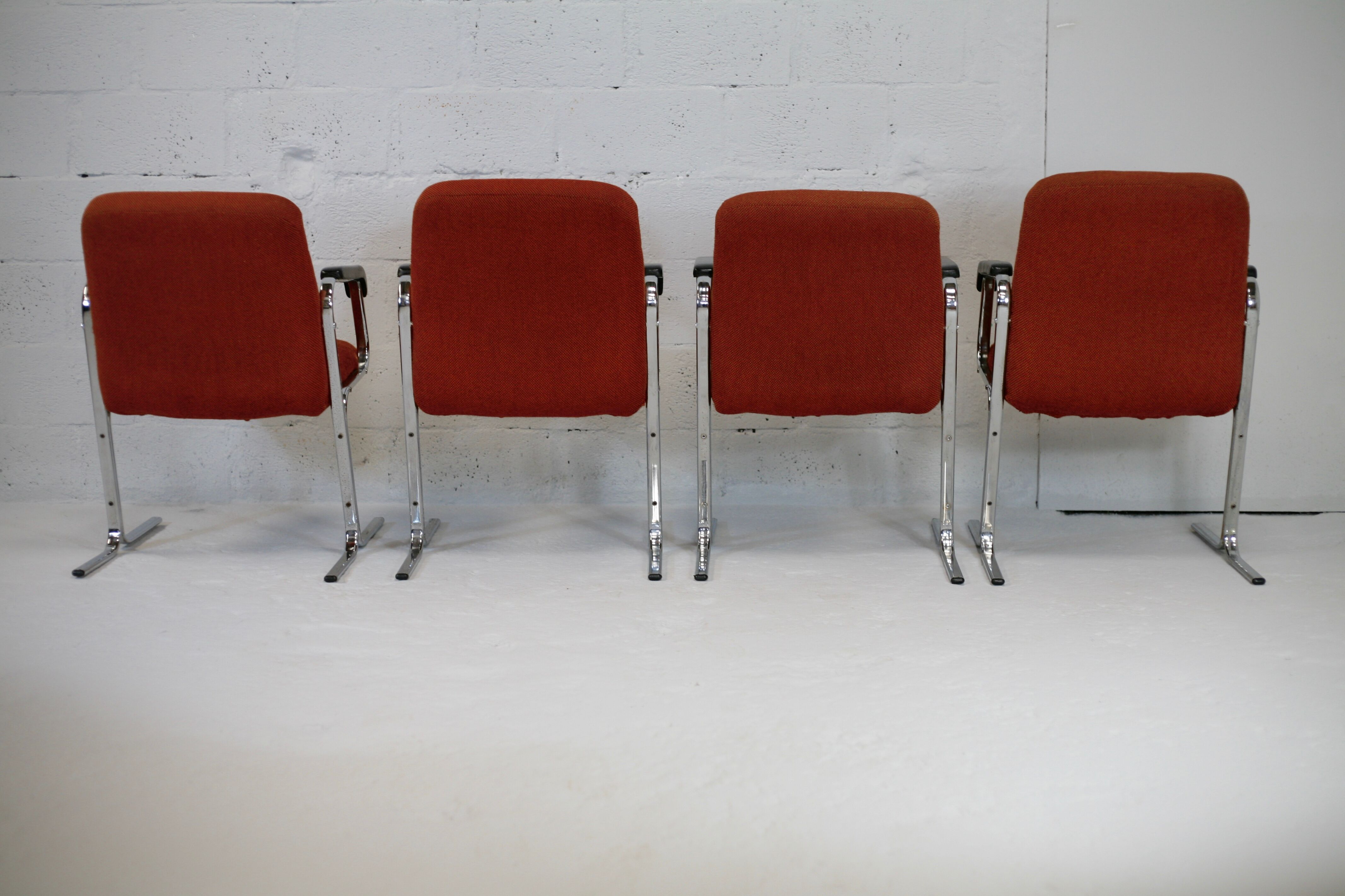 4 "space age" armchairs, chrome steel base