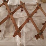 Extendable wall coat rack