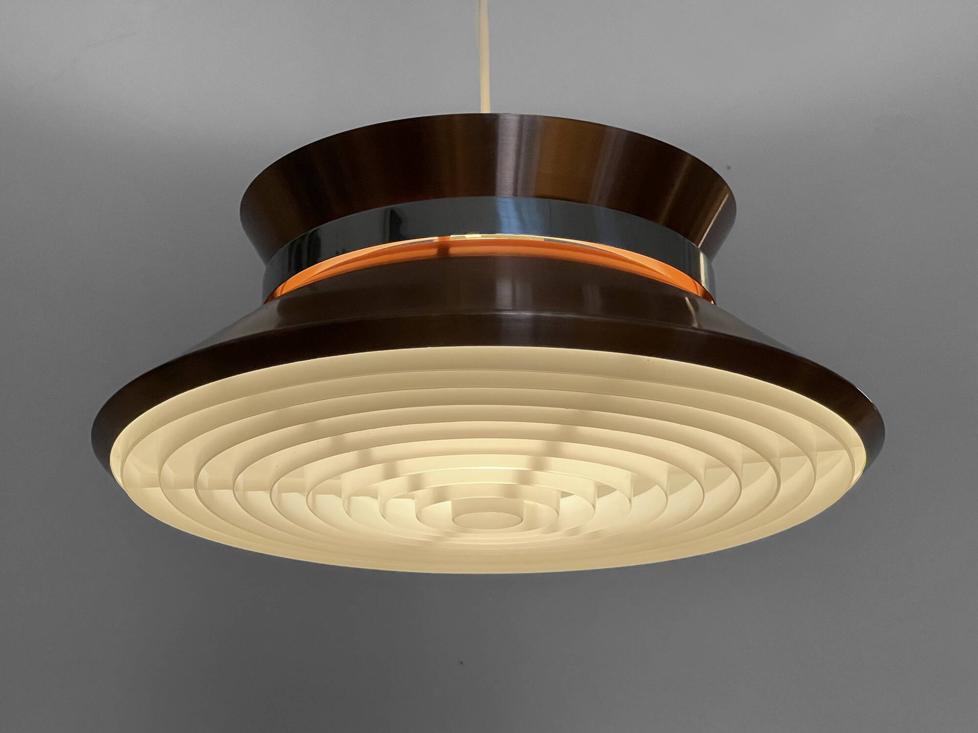 Copper colored aluminium pendant light by Carl Thore for Granhaga Metall. Sweden 1970s