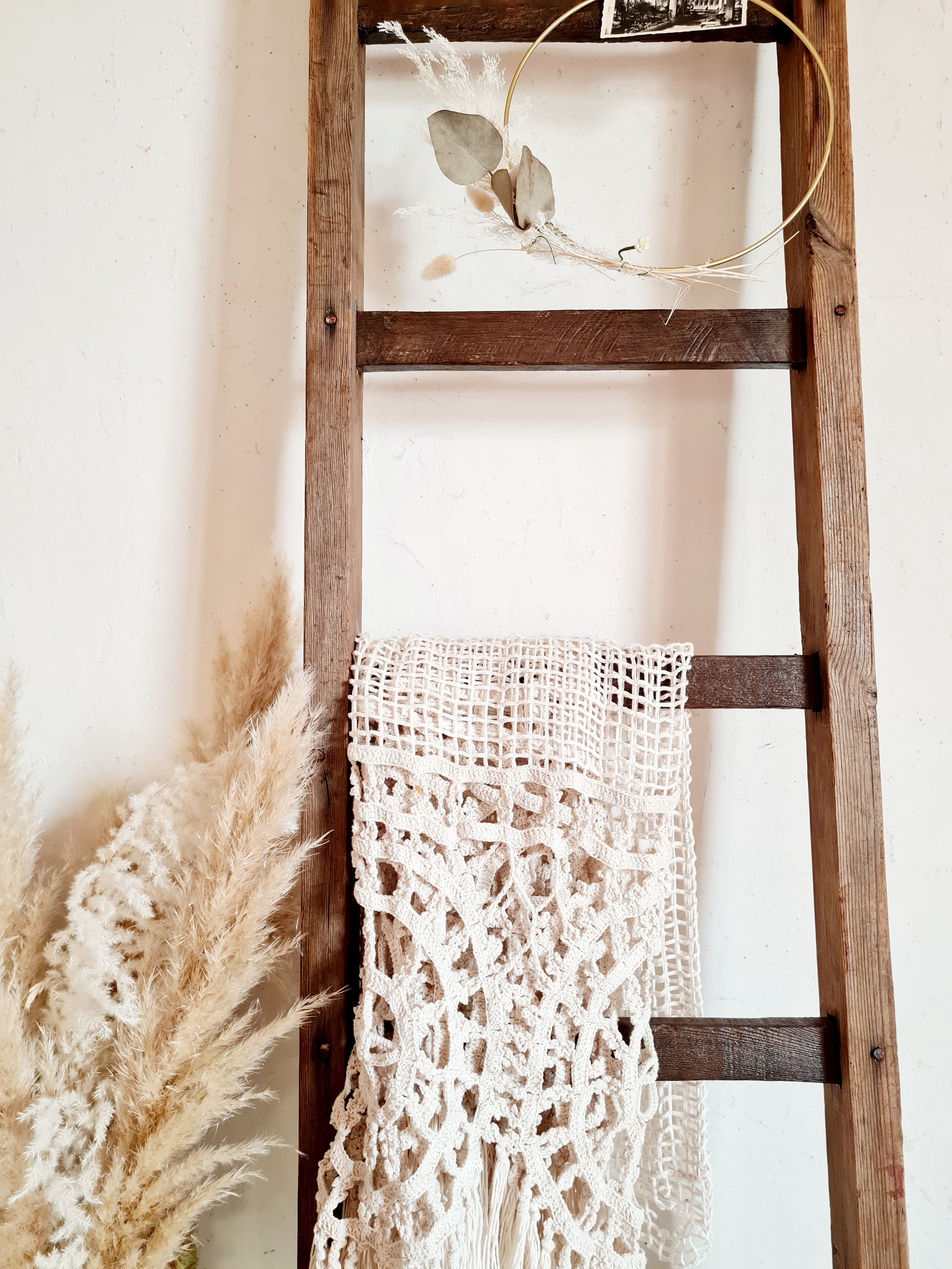 Old wooden farm ladder