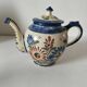 Henriot Quimper teapot – floral relief decoration