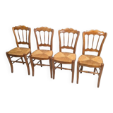 4 rustic farmhouse chairs made of wood and straw