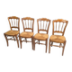 4 rustic farmhouse chairs made of wood and straw