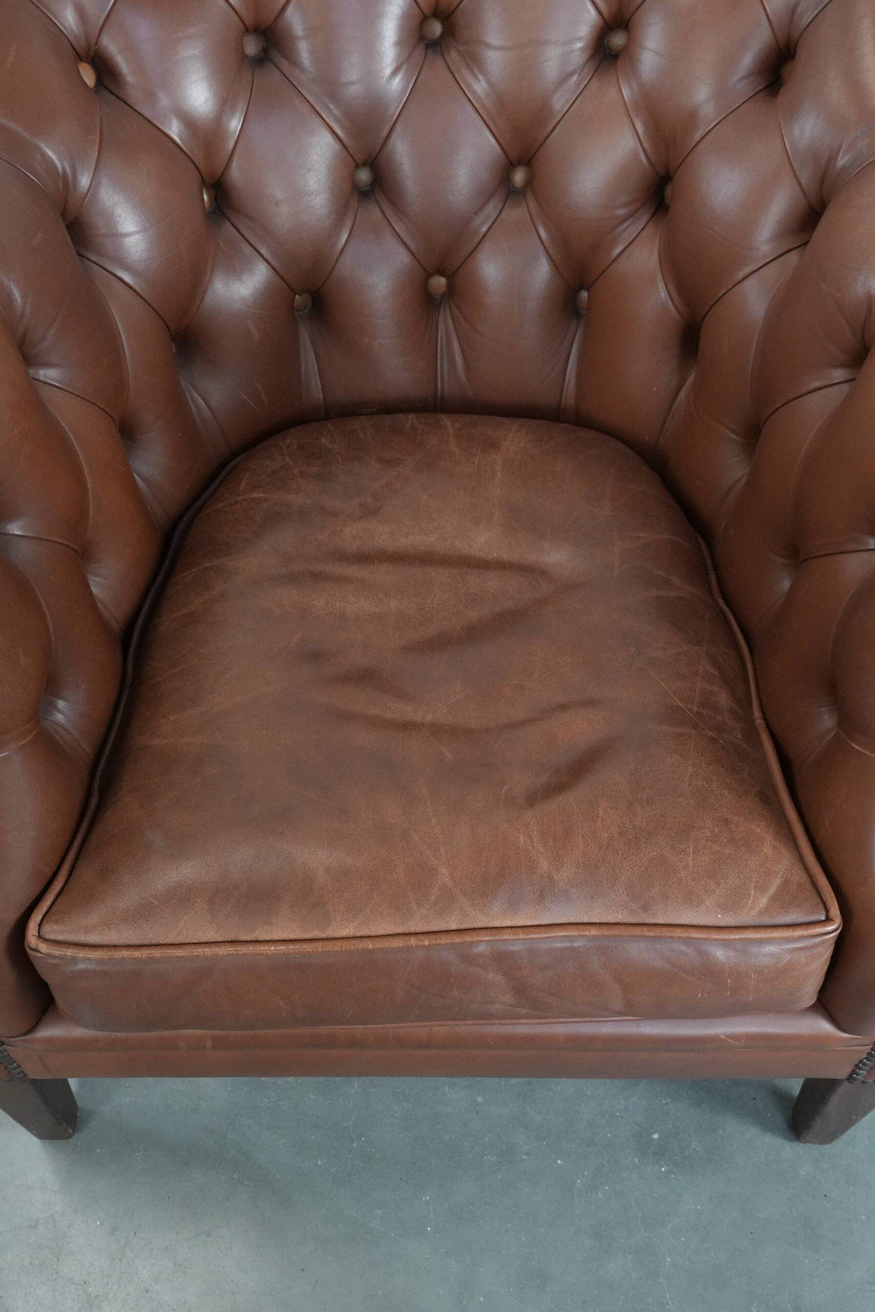 Chesterfield club armchair made of cowhide leather in English style