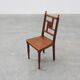 Art Deco oak side chair with carved rosette back and turned front legs, Bel