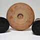 Three vintage light and dark wood candlesticks