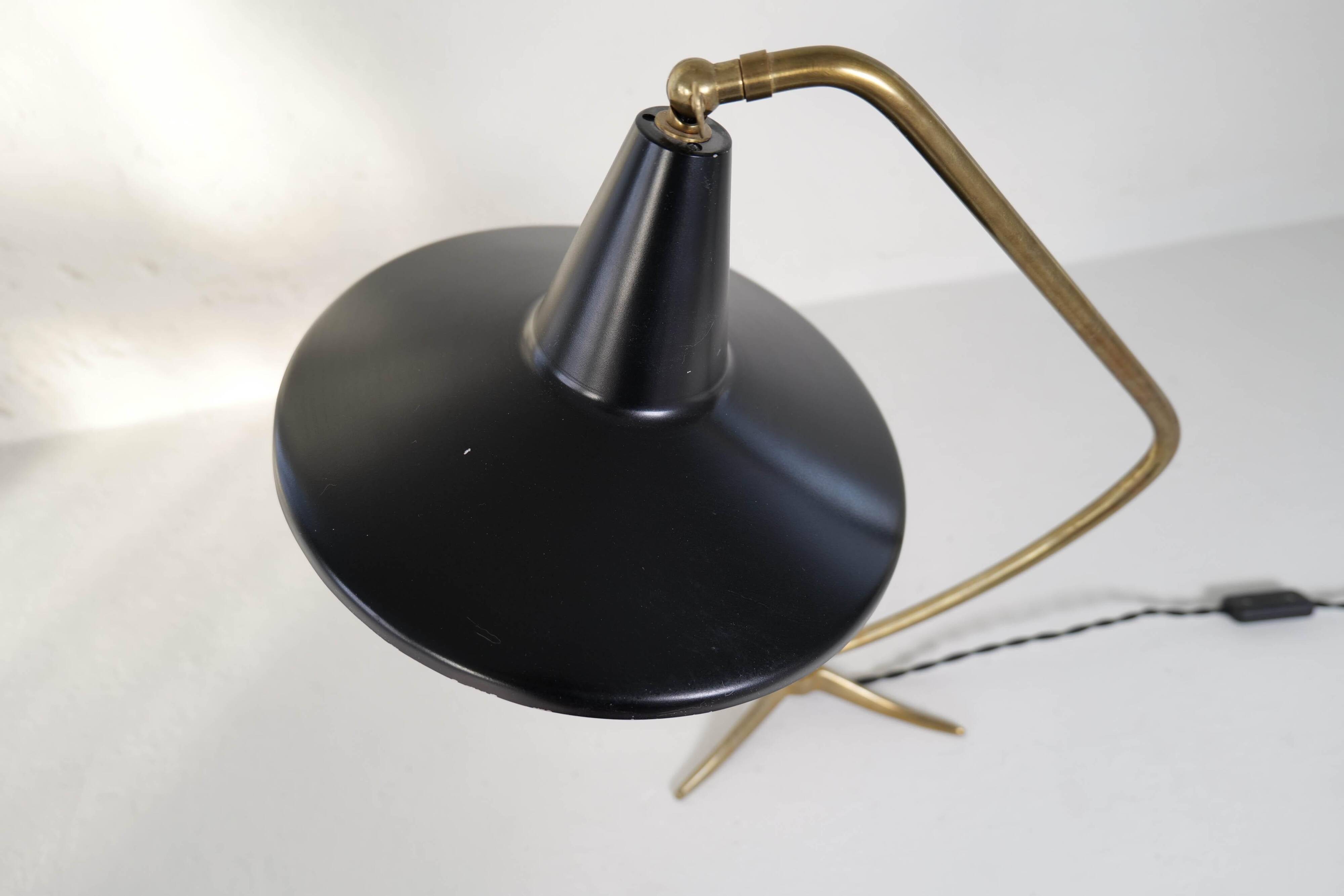 Brass table lamp on a tripod in modern Swedish style, Sweden, 1950.