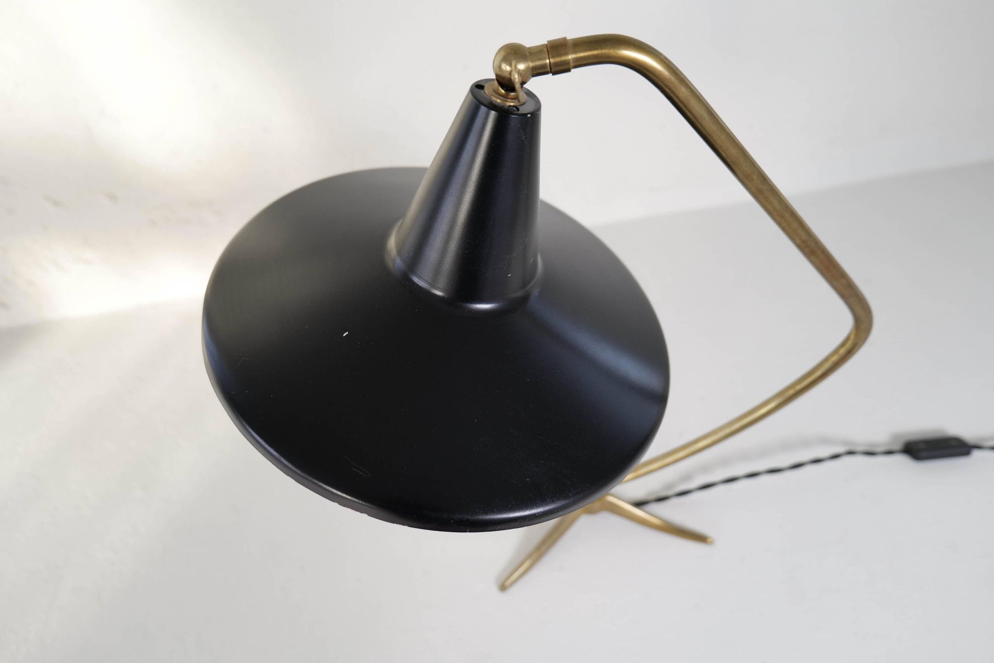 Brass table lamp on a tripod in modern Swedish style, Sweden, 1950.