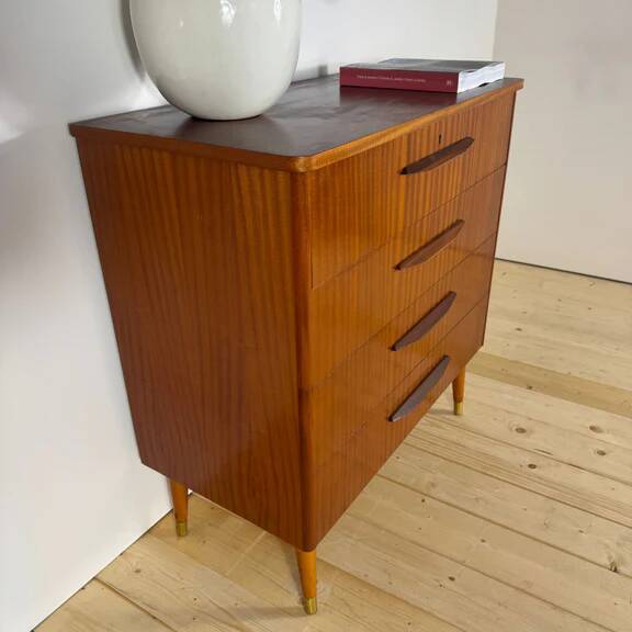 Danish mid-century chest of drawers with four teak drawers.