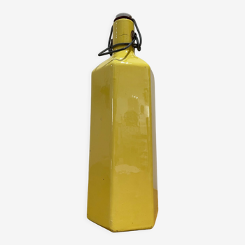 Yellow ceramic bottle