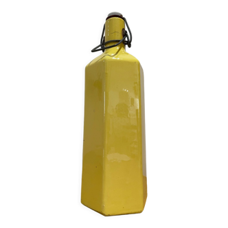 Yellow ceramic bottle