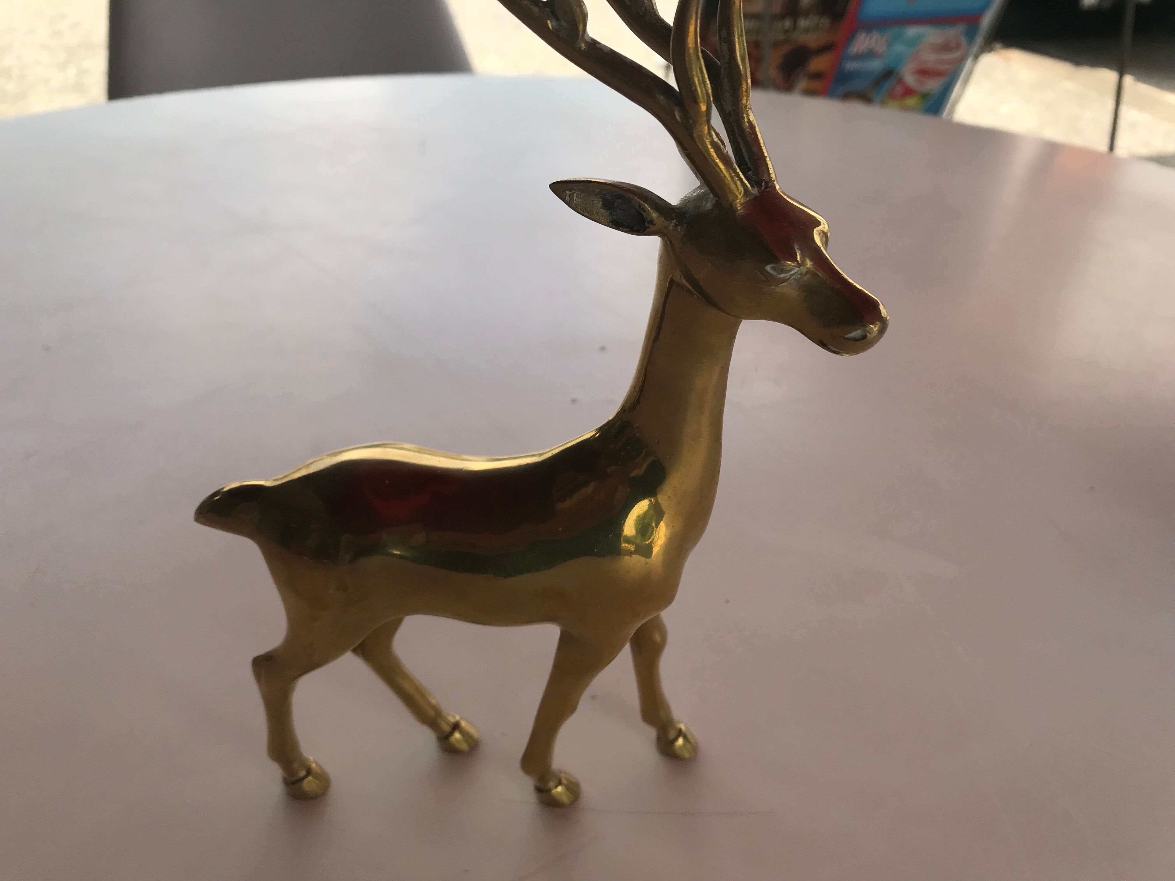Deer statue in gilded bronze