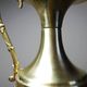 Vintage decorative jug in moulded glass and gilded brass, Italy circa 1980.