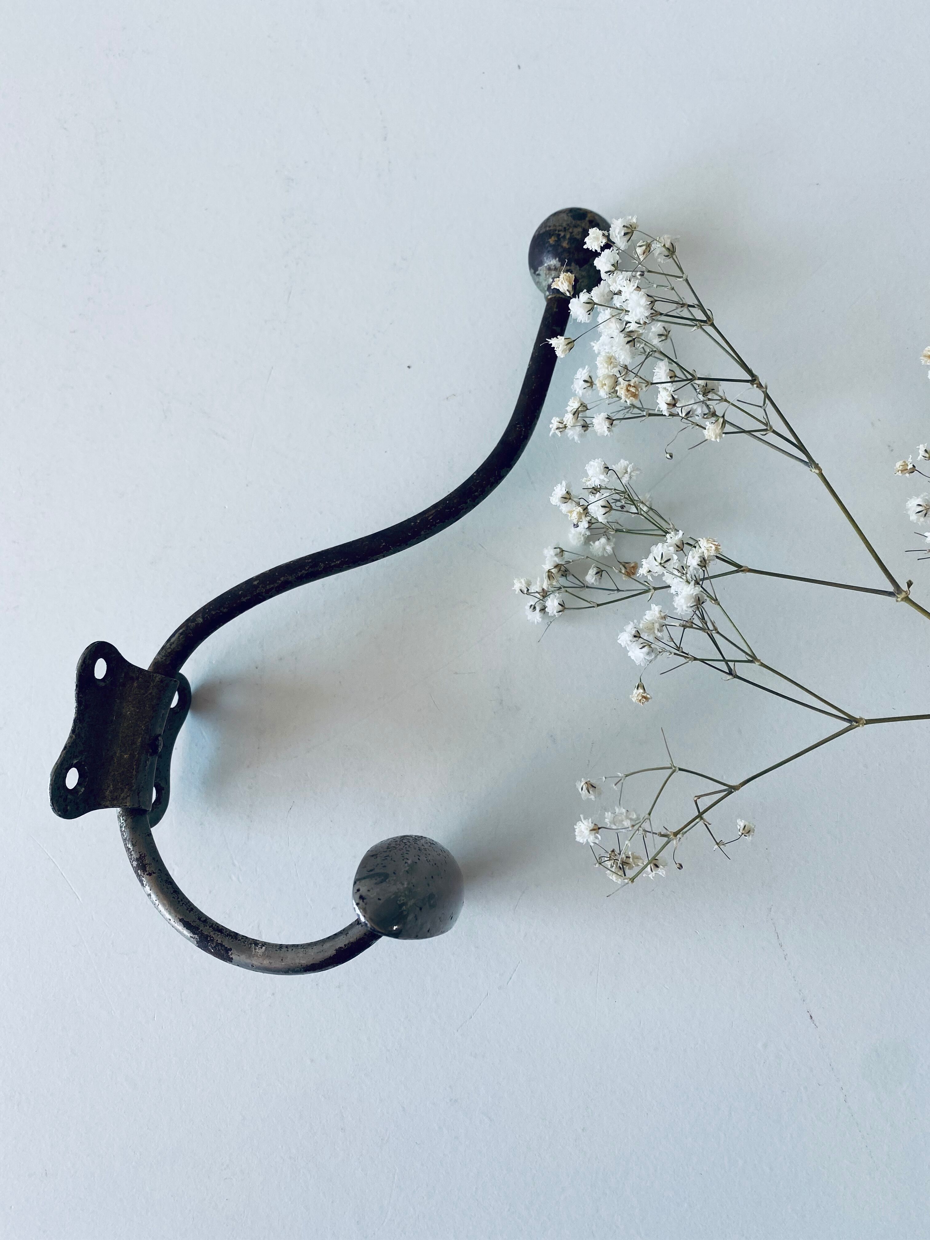 Ancient metal patère