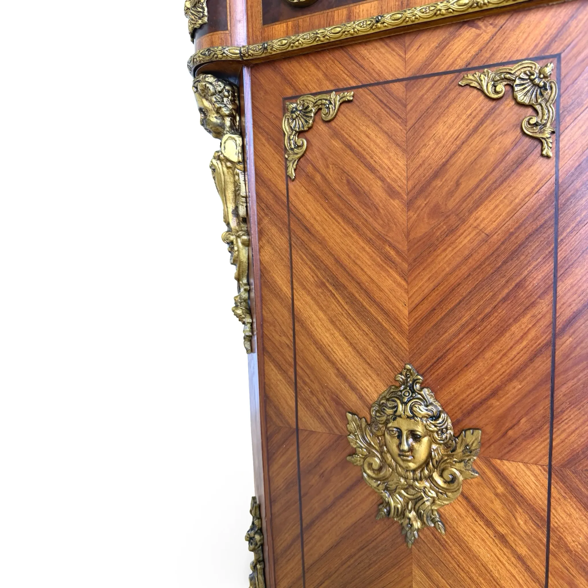 An antique French Louis XVI-style marble-top side cabinet