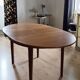 Scandinavian oval teak table with integrated extensions, 1960s, as good as new.