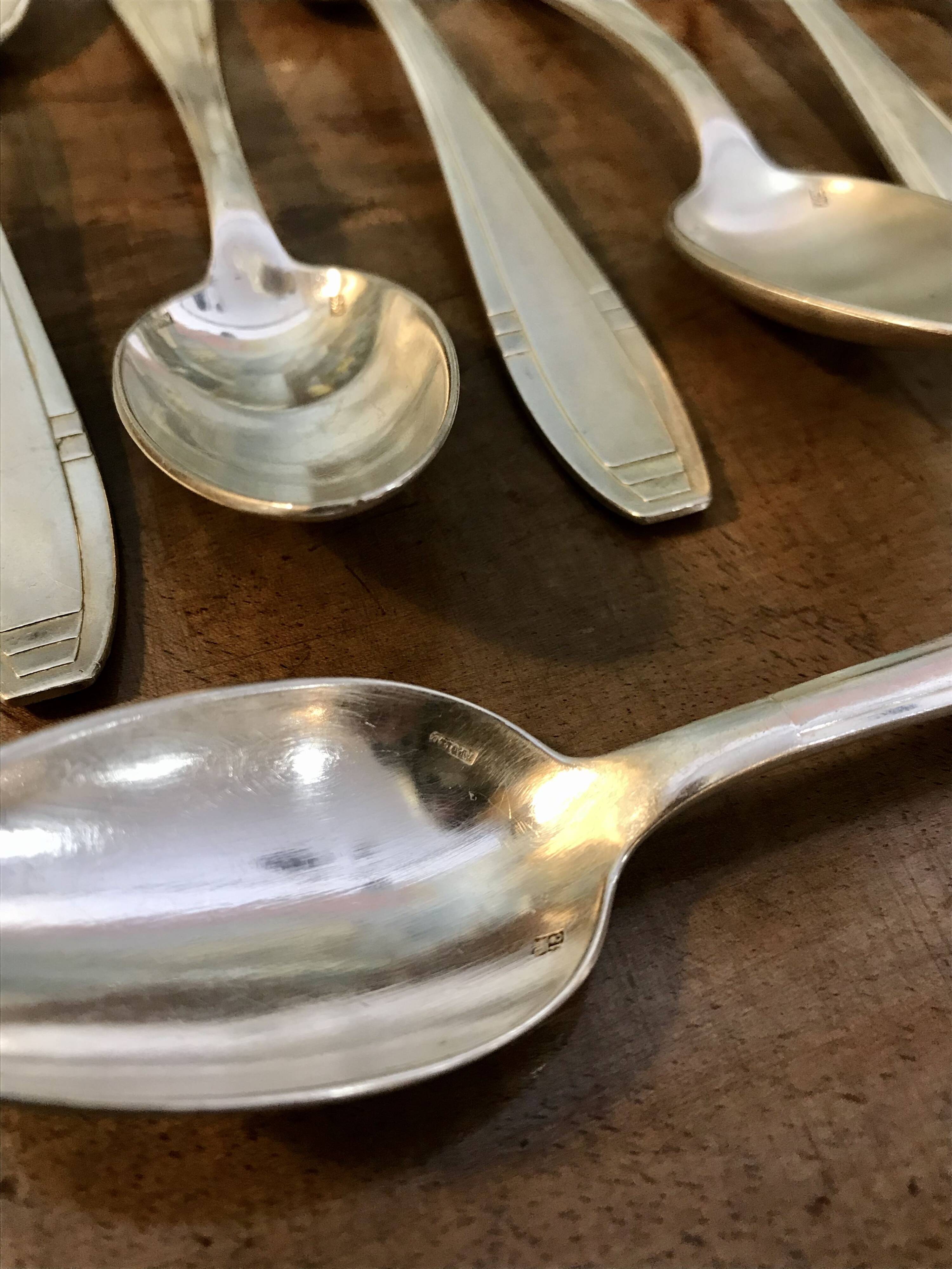Set of 12 Apollo brand silver-plated metal teaspoons