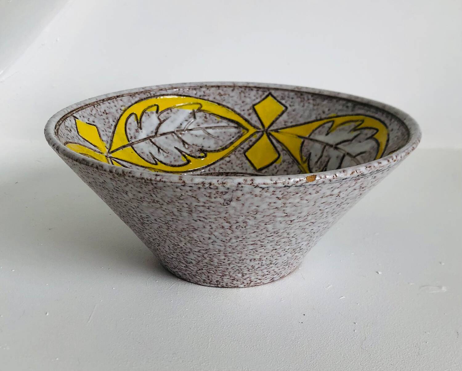 Trapezoidal vase by Fratelli Fanciullaci with plant decoration