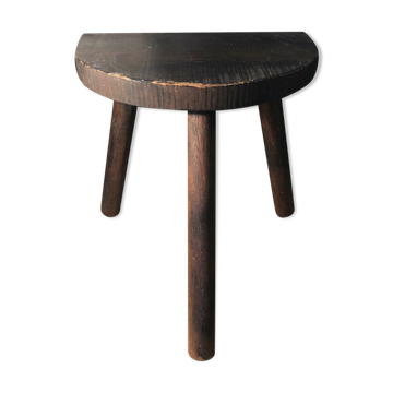 Wooden milking stool on tripod base