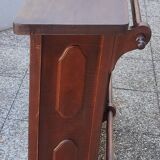 Bar counter in solid exotic teak wood; molded panel decor.