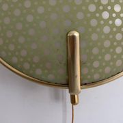 Pair of green plexiglass and gold metal wall lights by Erco, 1950s, Germany.