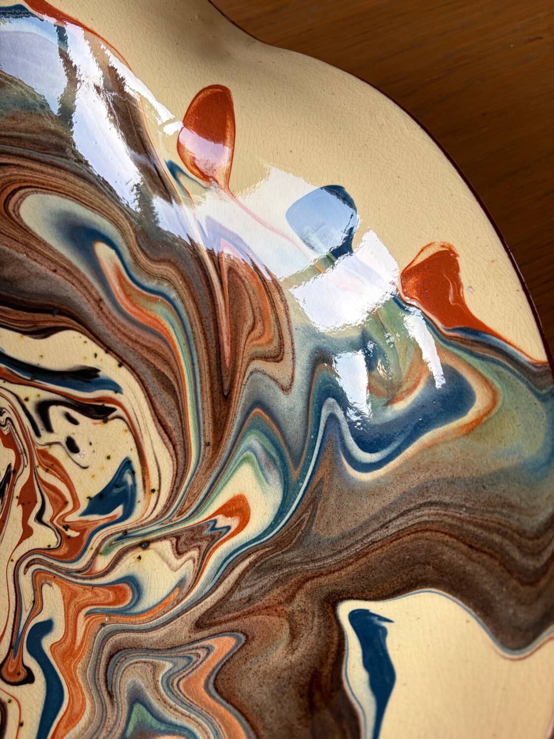 Glazed ceramic plate signed