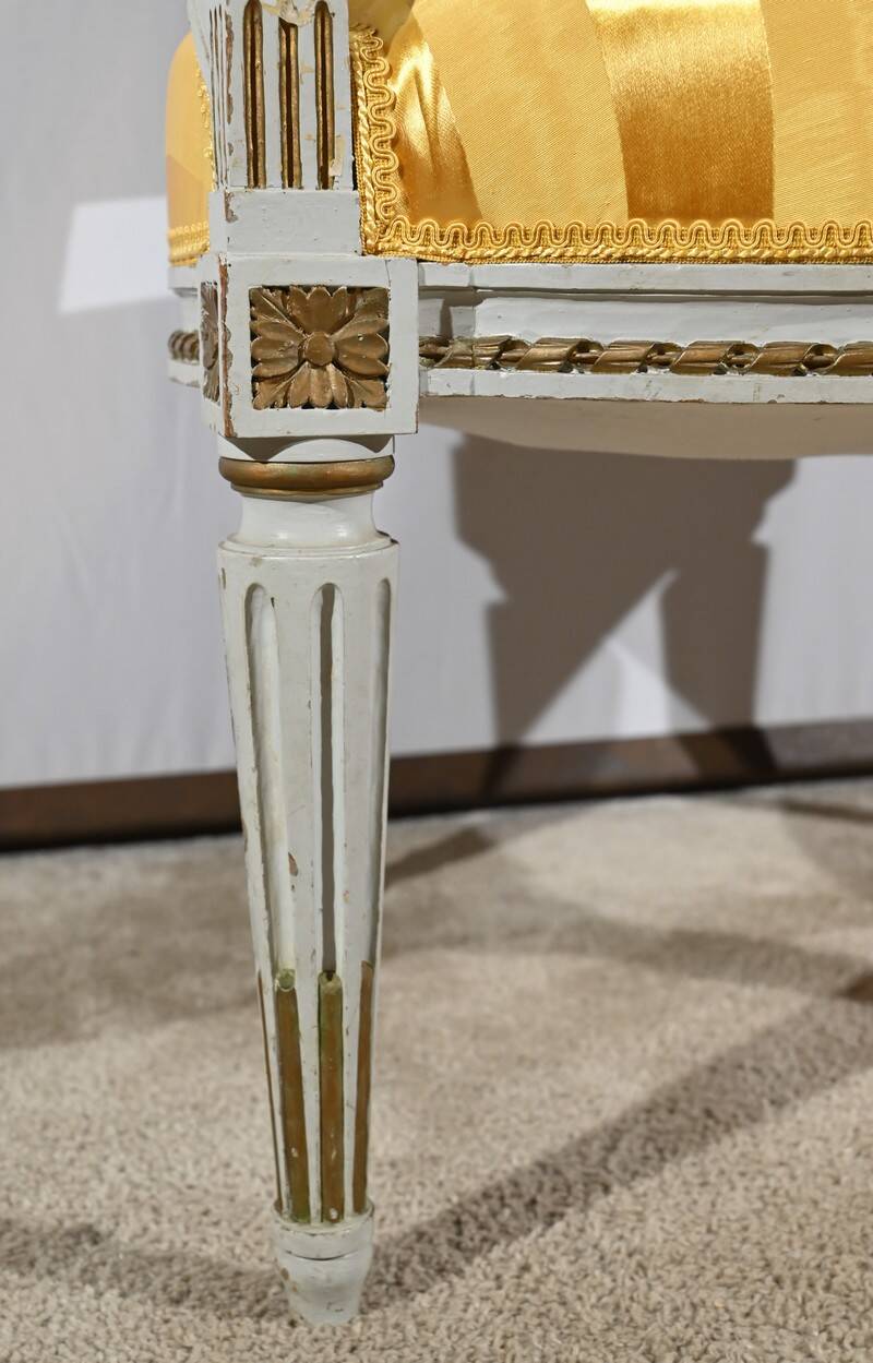 Pair of Cabriolet Armchairs, in rechampi wood, Louis XVI style – Late 19th century