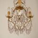 French gilt bronze three-light cage chandelier with pink and clear beaded swags.